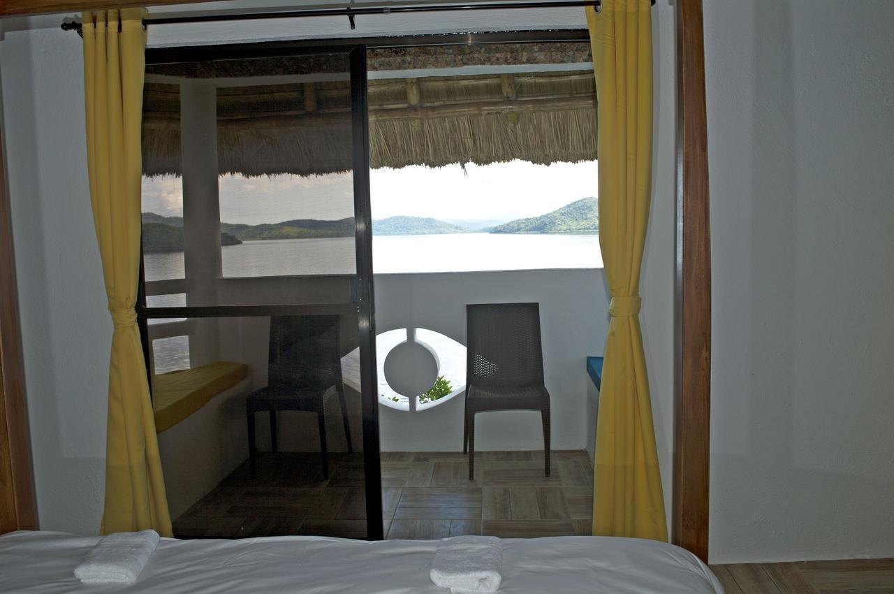 Iris Island Eco Resort Бусуанга Экстерьер фото